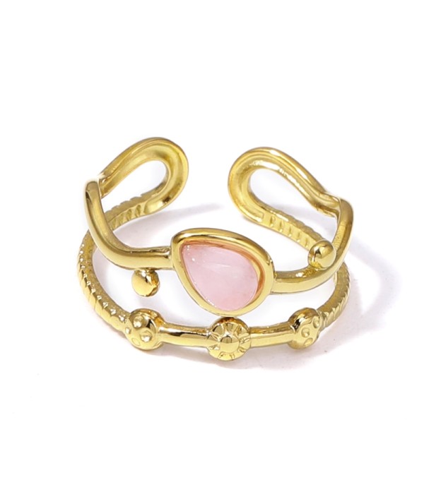 Anillo dorado con piedras