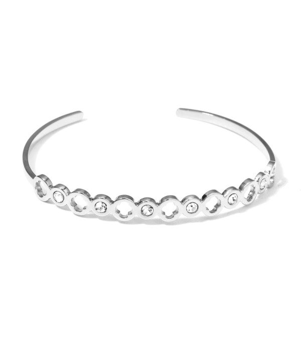 Pulsera rígida plateada con aros de círculos y circonitas