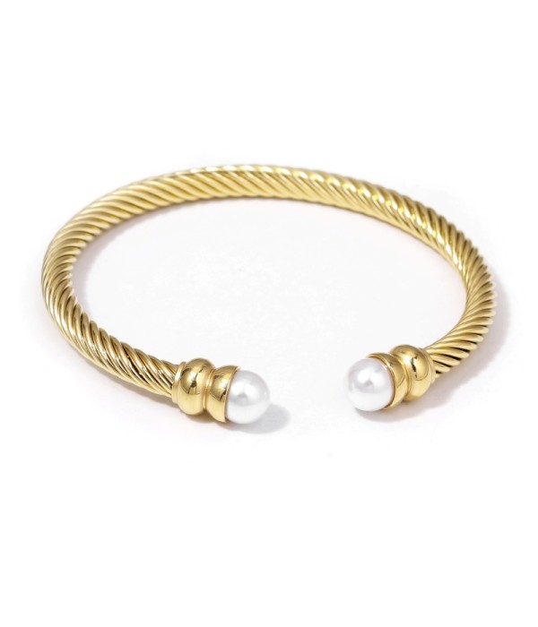 Pulsera rígida dorada con arco trenzado