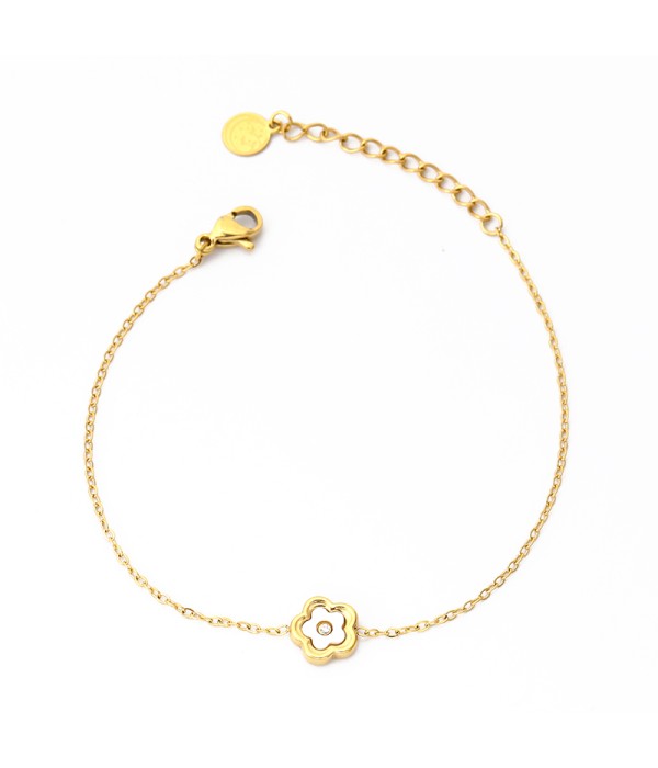 Pulsera dorada con flor