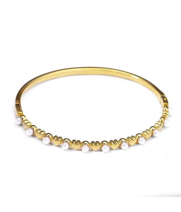 Pulsera rígida dorada tipo manguito