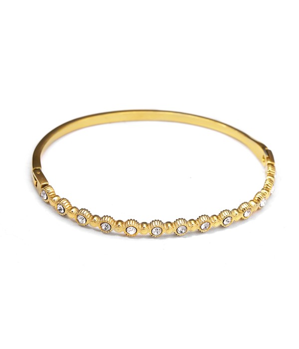 Pulsera rígida dorada tipo manguito