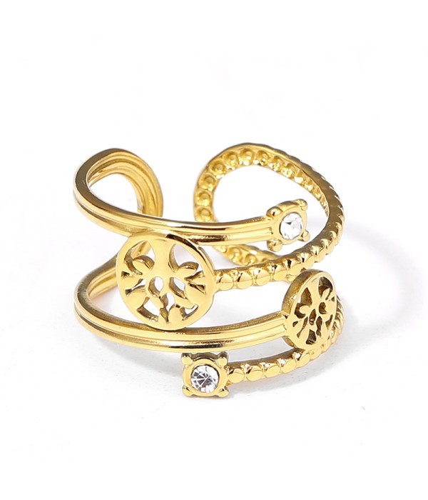 Anillo dorado con bandas entrecruzados