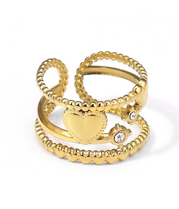 Anillo dorado con bandas entrecruzados