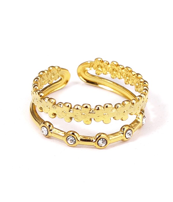 Anillo dorado de aros de flores y circonitas