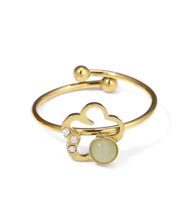 Anillo dorado con flor y piedra