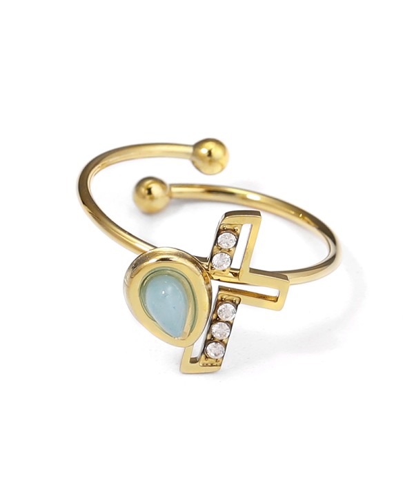 Anillo dorado con cruz y gota