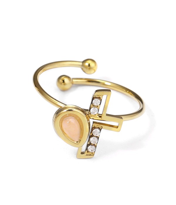 Anillo dorado con cruz y gota