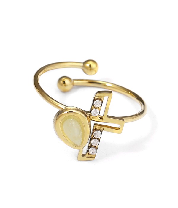 Anillo dorado con cruz y gota