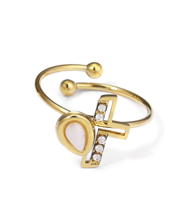 Anillo dorado con cruz y gota