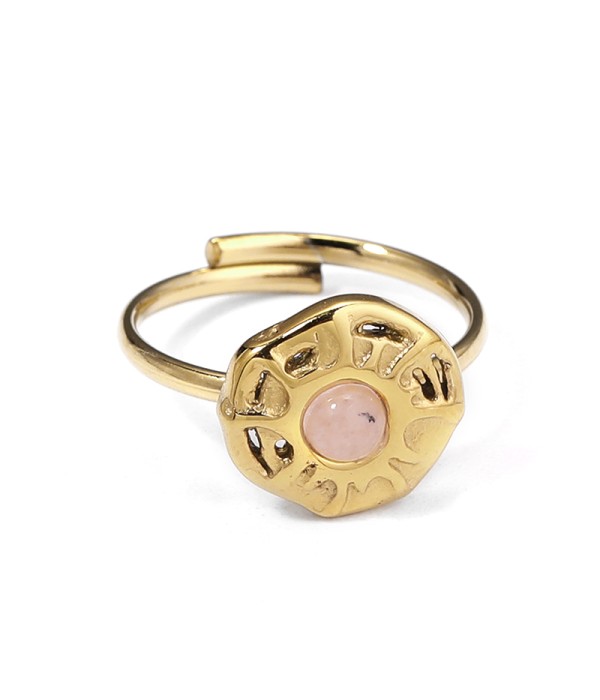 Anillo dorado con símbolo solar