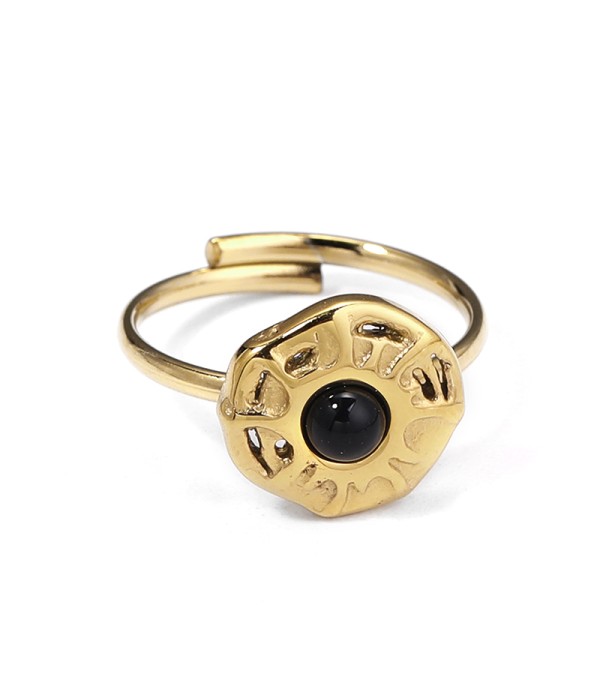 Anillo dorado con símbolo solar