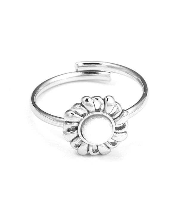 Anillo plateado flor radiante