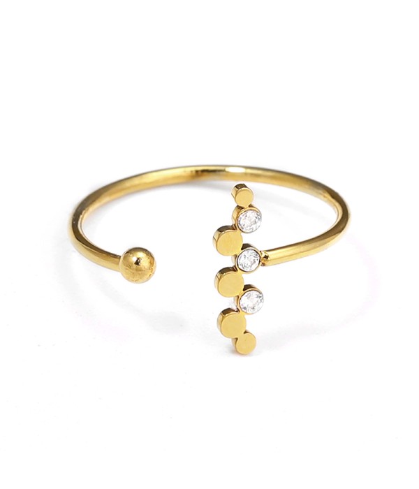 Anillo abierto con círculos y circonitas