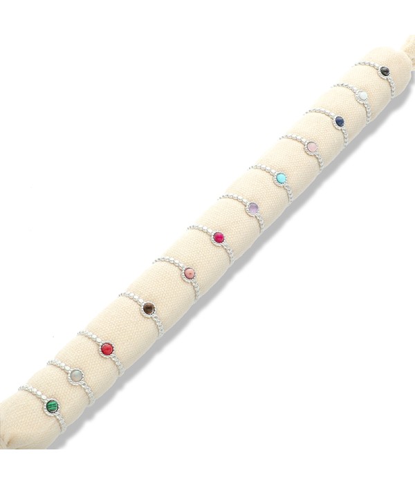 Conjunto de 12 anillos con piedra de color