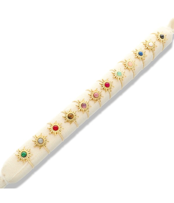 Conjunto de 12 anillos con diseño de sol y piedra central