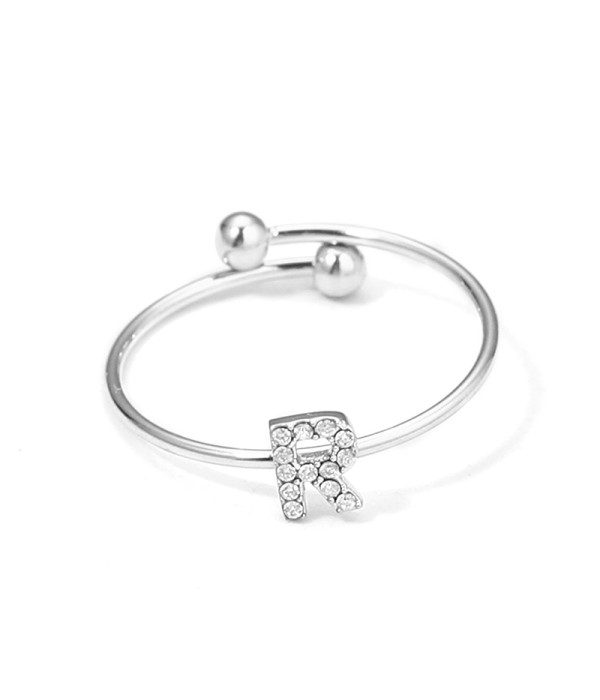 Anillo plateado con letra “R” y circonitas