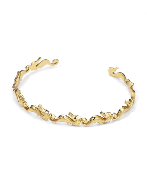 Pulsera rígida dorada con caballitos de mar