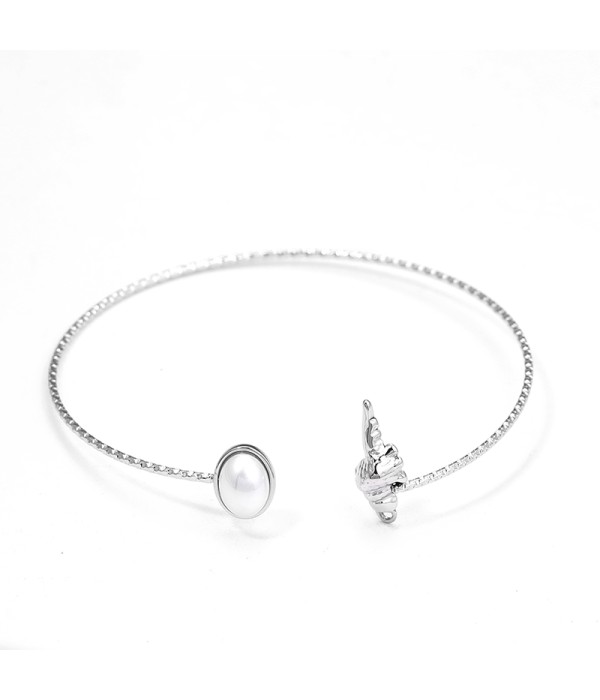 Pulsera rígida con caracola y perla ovalada 2