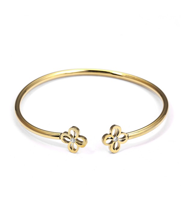 Pulsera rígida dorada con flores caladas y circonitas central