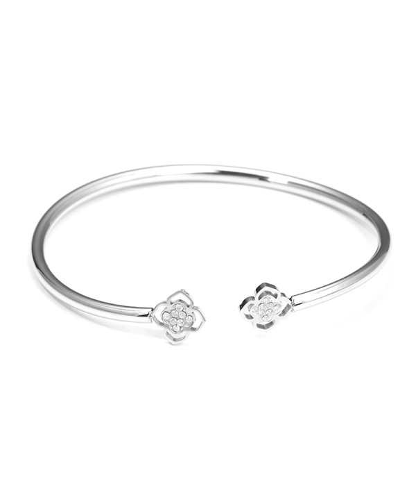 Pulsera rígida plateada con flores caladas y circonitas