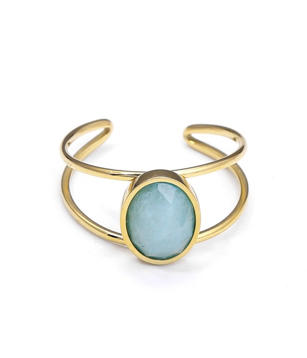 Anillo tipo brazalete con piedra ovalada