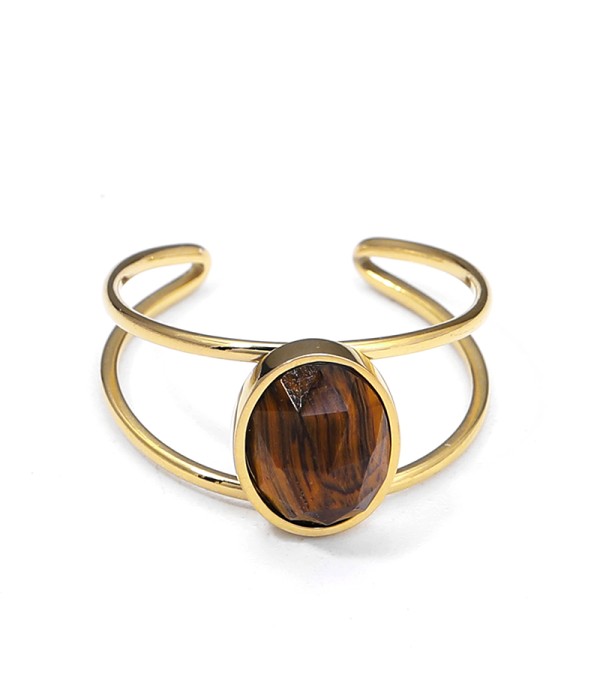 Anillo tipo brazalete con piedra ovalada