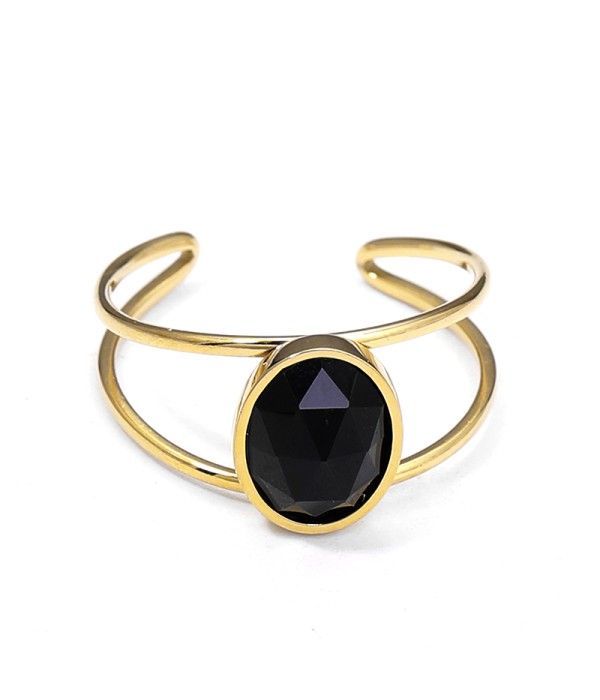 Anillo tipo brazalete con piedra ovalada