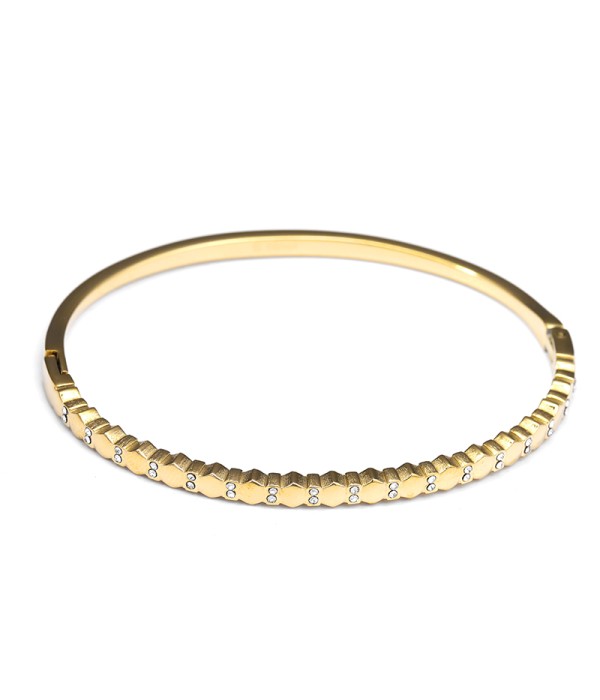 Pulsera rígida dorado con textura geométrica y circonitas